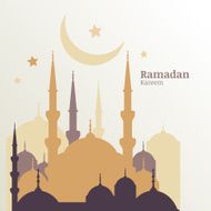 Ramadan Kareem greeting card with silhouette of golden mosque