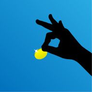 Gold coin in hand