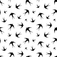Seamless pattern with black swallows on white Vector illustration