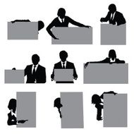 Waist up business people holding signs