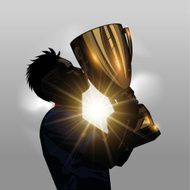 Soccer player kissing trophy