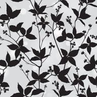 Leaves and flowers silhouettes seamless pattern