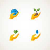 Sign with hand holding elements Earth heart sprout water drop