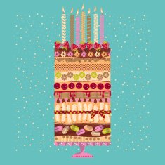 Big multilayer cake with candles and berries