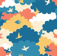 Colorful seamless pattern with birds and clouds