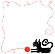 Cat playing with ball of yarn