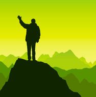 Man waving on a mountain top