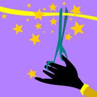 Hand holding scissors cuts the ribbon