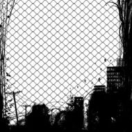 wire netting and city silhouette