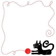 Cat playing with ball of yarn