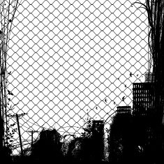 wire netting and city silhouette