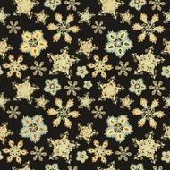 Seamless decorative pattern with paisley snowflakes