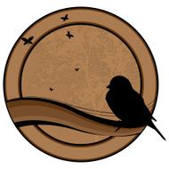 Badge with bird silhouette