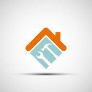 Silhouette of a house with wrench and hammer