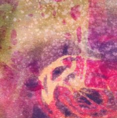 Paint splatters on a brightly colored textured background