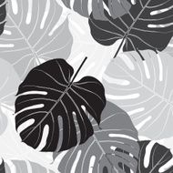 Seamless pattern with palm leaves Monochrome background