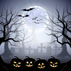Halloween graveyard and pumpkins in foggy forest