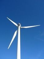 turbine with blades against the blue sky