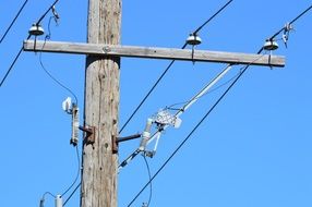 power lines on a telephone pole