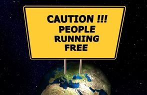 Stand with the inscription "caution !!! people running free" on the background of the earth