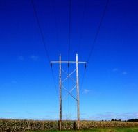 blue bright sky over power line