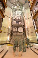 people inside the payload changeout room for space shuttle