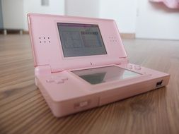 old pink nintendo device