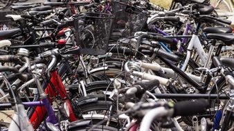 bicycles in the parking lot near the park