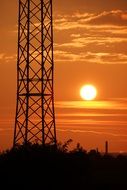 metal pillar against sunset