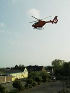 rescue helicopter flies to residential area