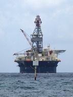oil rig on a ship at sea