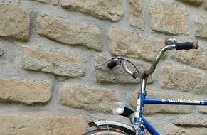 Bicycle at the stone wall