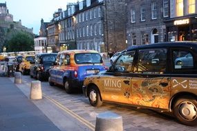 parking lot with colorful taxis