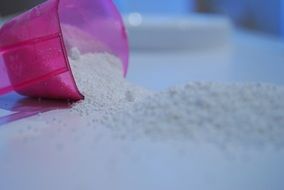 powder scattered near the pink container