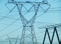 electric pylons against the sky