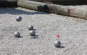 Different balls on gravel