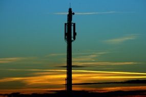 electric pole at bright sunset