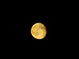 photo of lighting moon in the darkness