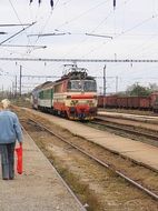 Electric locomotive is on railway