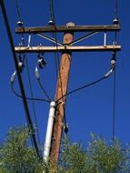 electricity power pole with wires and cables at sky