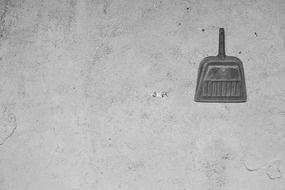 shovel dirt wall negative space