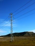 Electrical tower on the field