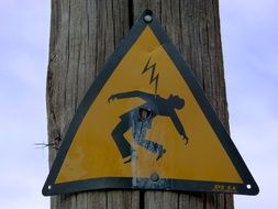 risk of electric shock sign on pillar