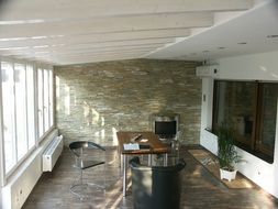 modern interior of a living room with fireplace