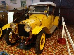 yellow retro car in the cabin