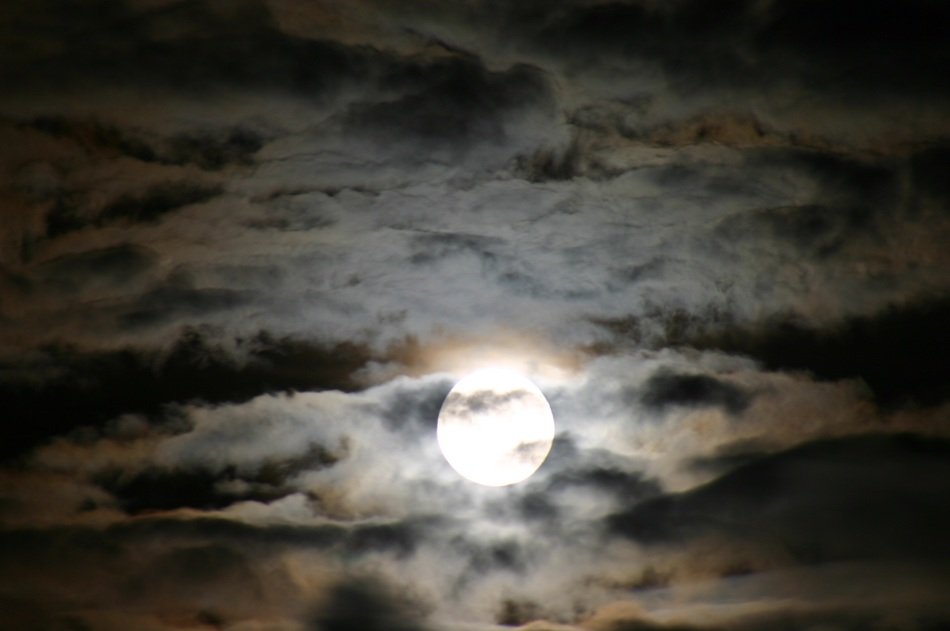 full moon in the night clouds