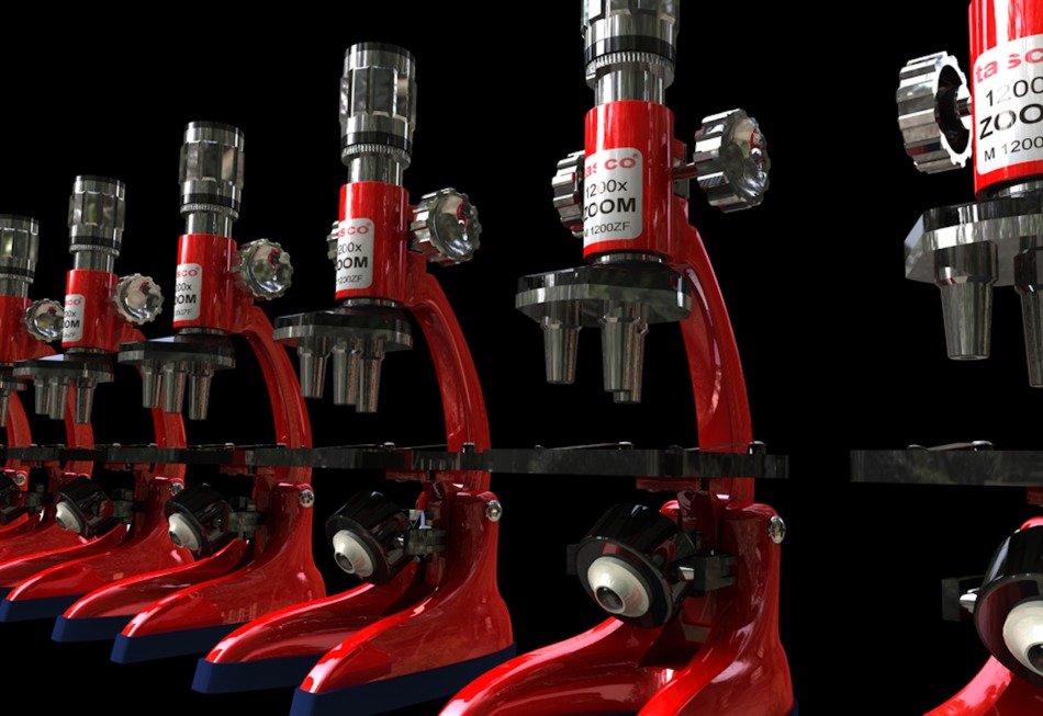 red microscopes on a black background