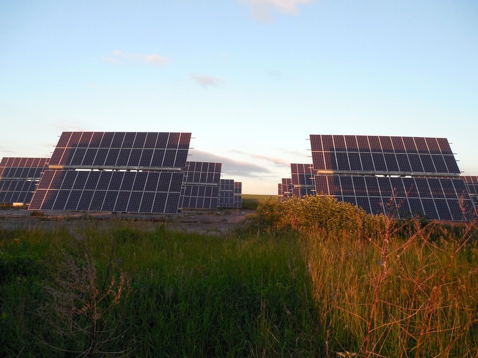 Huge solar panels in the glare of the sun