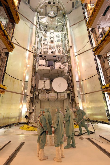 people inside the payload changeout room for space shuttle