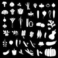 Vegetables white silhouettes set on black background